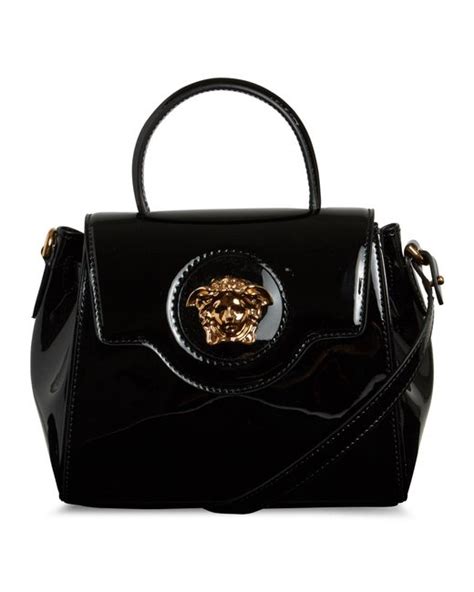 borsa versace vernice nera e dorata|Borse .